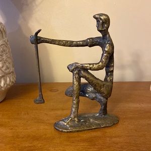 Metal golf statue